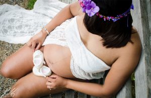 Pregnancy photography NYC blossom purple flowers inspiration