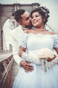 Wedding photography, Brooklyn bridge and groom kissing couple photography by Hortiz photography, video and Film